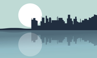 Silhouette of city and reflection with full moon