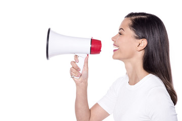 Casual young woman holding megaphone