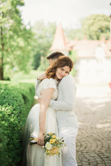 Beautiful, perfect couple posing on their wedding day