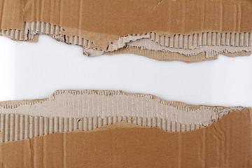Gap in ripped corrugated cardboard