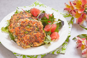 Healthy salmon quinoa kale burger