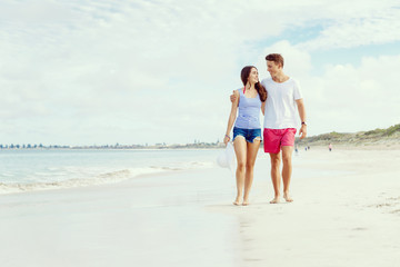 Romantic young couple on the beach