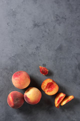 Fototapeta na wymiar Peaches on gray