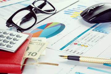 Financial charts and graphs on the table