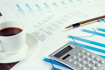Financial charts and graphs on the table