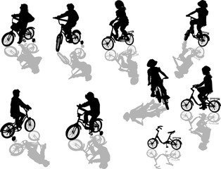 group of black bicyclists with shadows on white