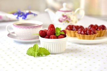Fruit raspberry tart cakes on a table