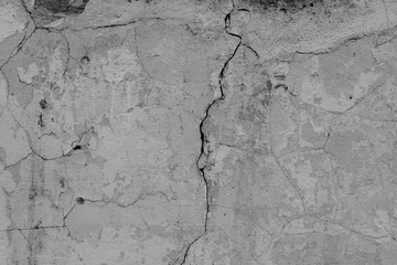 Wall fragment with scratches and cracks