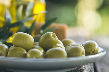  dish of olives on wooden background © tetxu