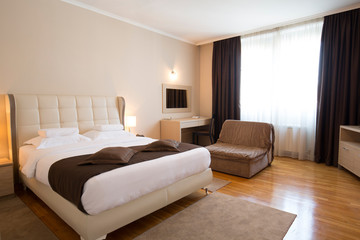 Modern elegant hotel bedroom interior