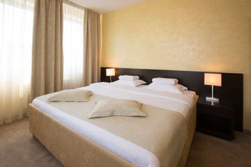 Modern elegant hotel bedroom interior