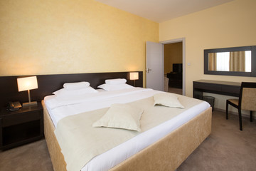 Modern elegant hotel bedroom interior