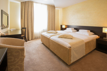 Modern elegant hotel bedroom interior