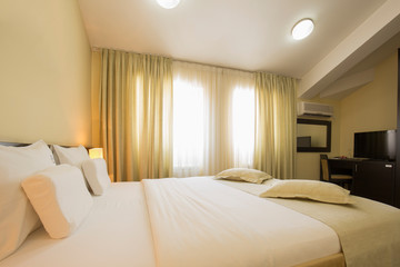 Modern elegant hotel bedroom interior