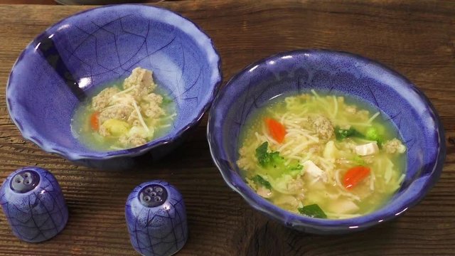 Chicken soup with pasta and vegetables 
