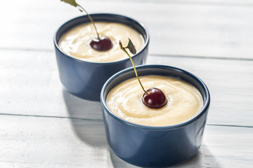 Custard with cherries