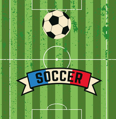 Obraz premium soccer ball rolls across the field to the gate