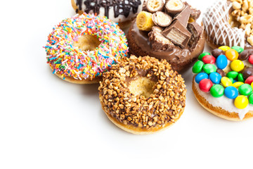 Delicious donuts with icing isolated on white