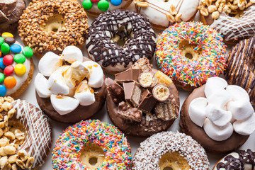 Close up of a selection of colorful donuts.