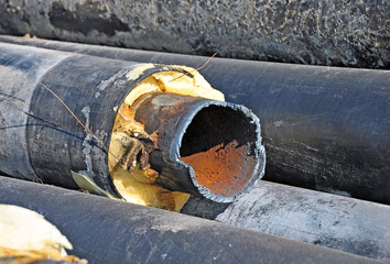 Rusty steel pipe with heat insulation