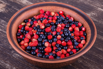 Fresh strawberries and blueberries , wild berry.