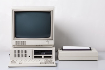 Old personal computer. The system unit, floppy drive, CRT monitor, printer and keyboard on white background. - obrazy, fototapety, plakaty