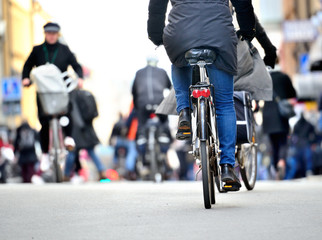 Fototapeta na wymiar Close up of bike and bicyclist in traffic