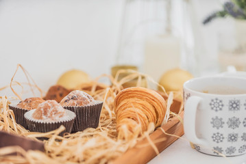 Breakfast with coffee and croissants