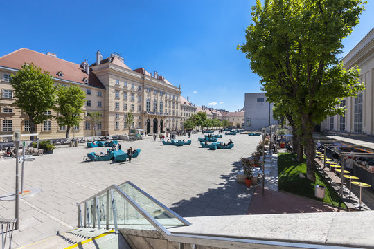 Many people enjoy a sunny afternoon at the Museumsquartier in Vienna