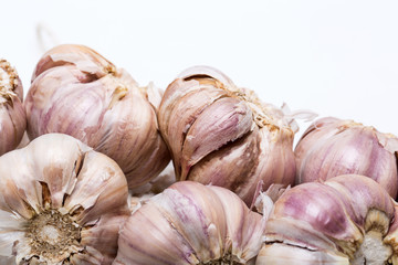 String of garlic isolated on white background