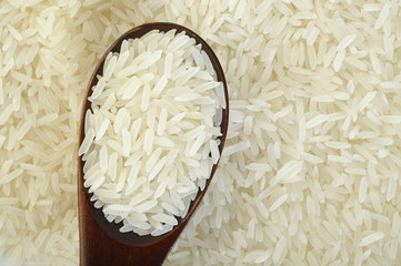 rice in wooden spoon