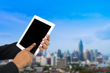 Businessman using tablet pc.