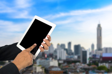 Businessman using tablet pc.