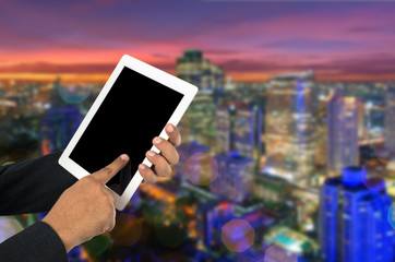 Businessman using tablet pc.