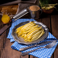 yellow string bean with bread crumbs