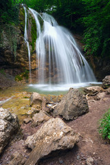 Fototapeta na wymiar Dzhur- waterfall on the river East Ulu-Uzen