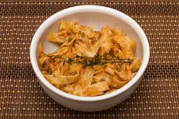 pasta  fettuccine bolognese in  dish