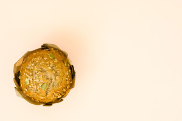 Delicious Muffin on brown background