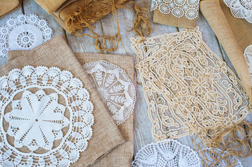 Lace and linen home decoration elements, top view