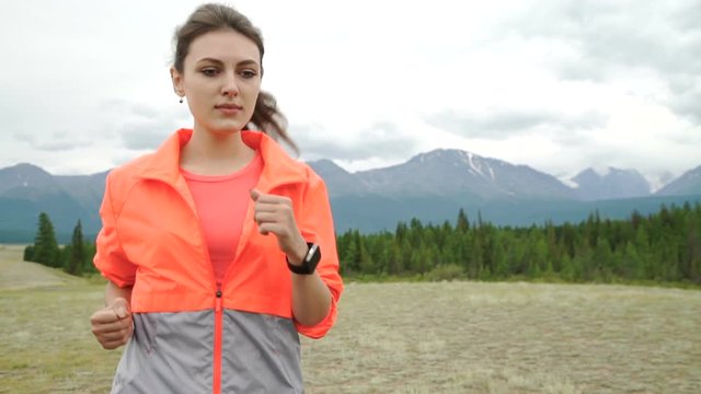 Young Woman Running In Mountains On Sunny Summer Day. Beauty Female Runner Jogging And Exercising Outdoors In Nature, Rocky Trail