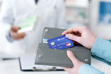 Woman buying products in the pharmacy