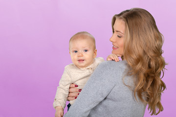 Happy young mother and her son