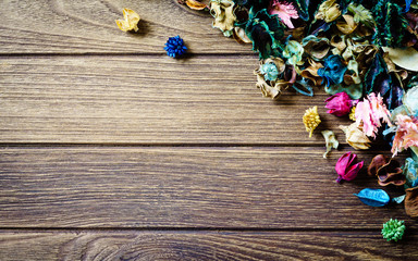 aromatherapy potpourri mix of dried aromatic flowers on wooden b