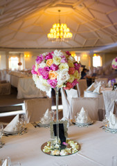 Beautiful table set for some festive event, party or wedding reception.