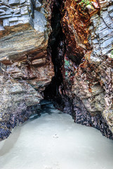 Looking into a beach cave.