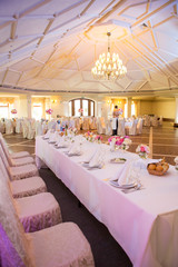 Beautiful table set for some festive event, party or wedding reception