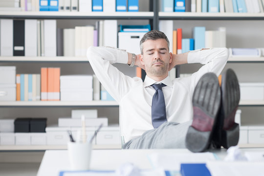 Businessman sleeping in the office
