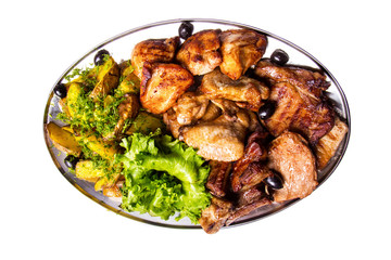 Grilled chicken wings and legs with lettuce and black olives