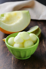 sweet ripe sliced melon balls in a bowl