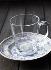Empty glass in the wooden background
